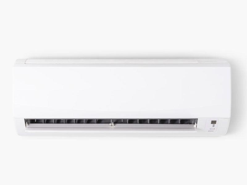 Air conditioner mounted on a white wall